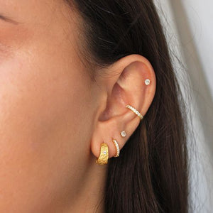 MURKANI Cosmic Love Small Huggie With White Topaz - 18KT Yellow Gold Plate Earrings - Zabecca Living