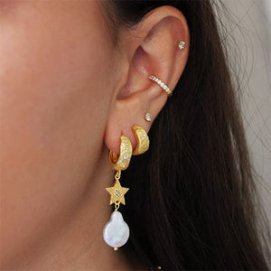 MURKANI Cosmic Love Small Huggie With White Topaz - 18KT Yellow Gold Plate Earrings - Zabecca Living