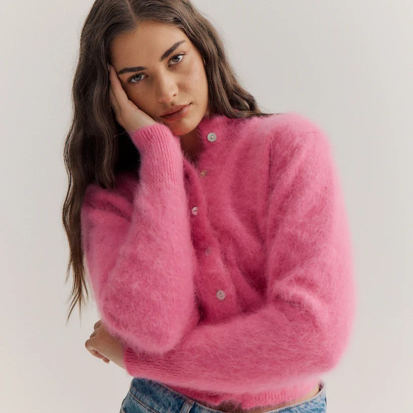 woman wearing pink-world-of-nomads-jumper from zabecca-living
