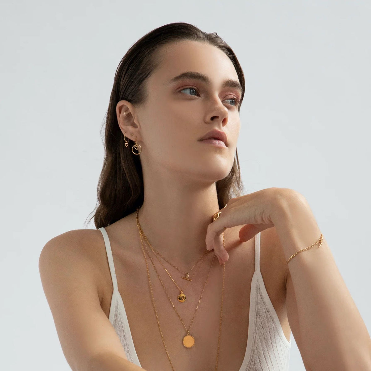 LINDA TAHIJA Micro Heart Stud Earrings - Gold Plated Earrings - Zabecca Living